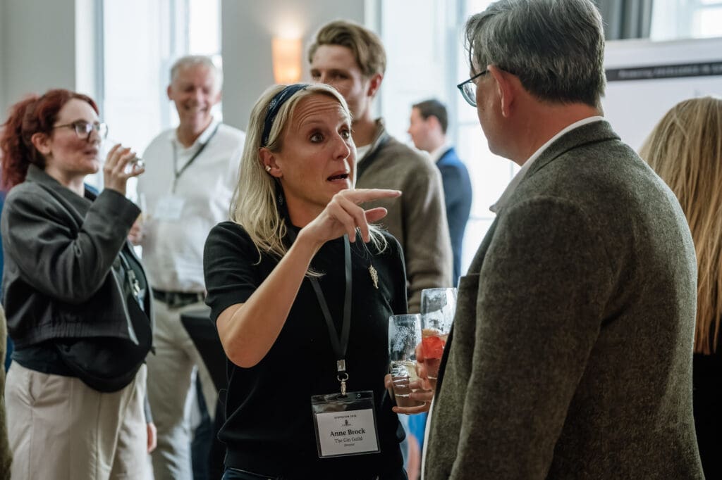 Delegate conversation during The Gin Guild Ginposium