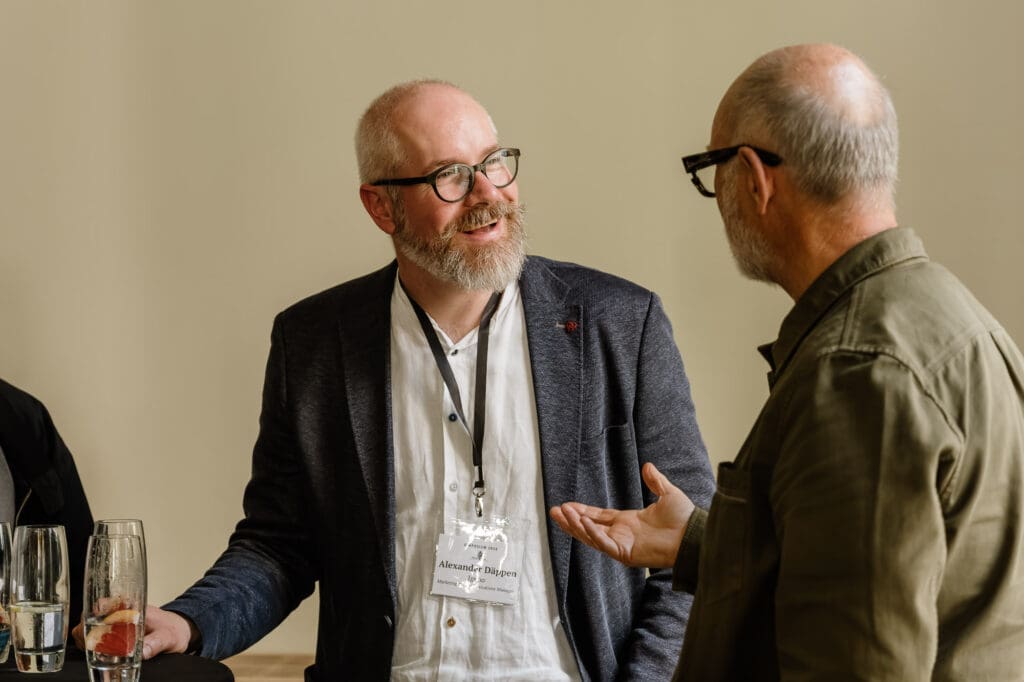 Candid networking moment at The Gin Guild Ginposium